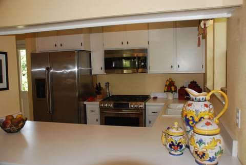 Counter barstools for visiting with the family chef.
