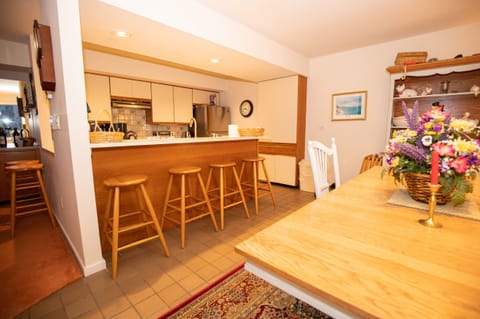 Two counters & bar stools around the kitchen