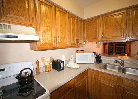 Full size kitchen with major appliances to make your own meals.