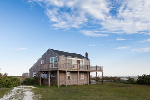 Beds and baths on the first floor, common areas upstairs.