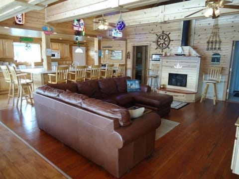 Through the doorway are 2 bedrooms and the stairway/ladder to the loft.