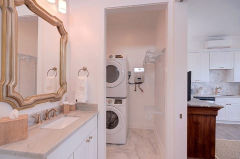 Laundry area and closet.
