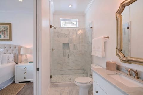 Luxurious Carrara marble bath.