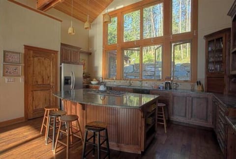 View of pantry and island in kitchen
