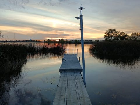 Park your water toys on either side of this 30 foot dock.