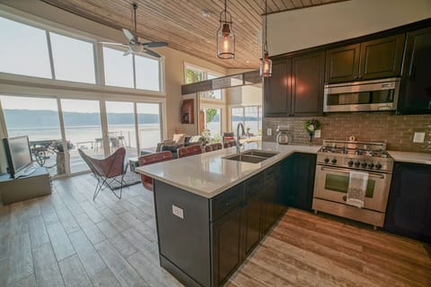 Boathouse kitchen, high end appliances,breakfast bar, swivel seating, heated flo