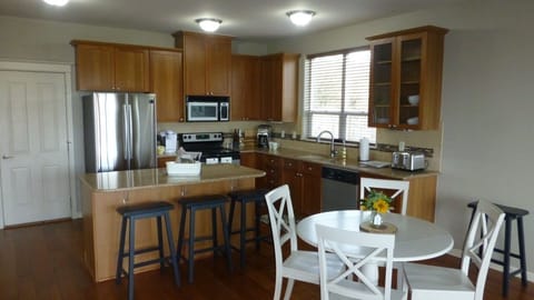 Fully stocked kitchen and breakfast nook.  Microwave, Air-Fryer, Pots & Pans.
