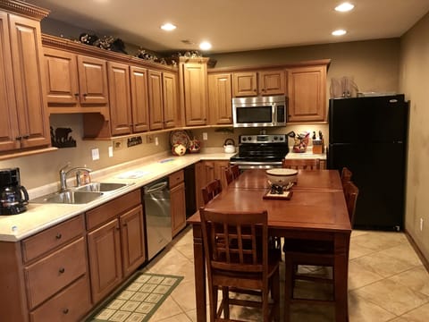 Lowest level full kitchen with second ice maker.