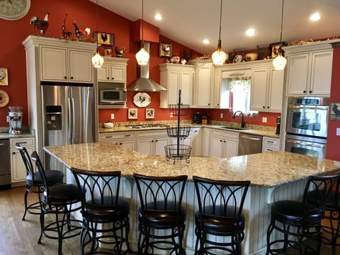 Kitchen with bar seating for 7