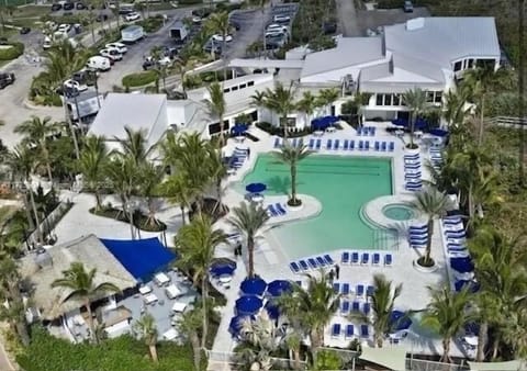 Visit our Spectacular heated pool  w/hot-tub. Tiki Bar & Restaurant by the pool