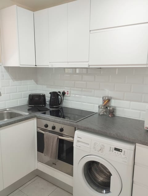 Electric Oven, Fridge Freezer, Washing Machine, Kettle, Toaster, Full Utensils  