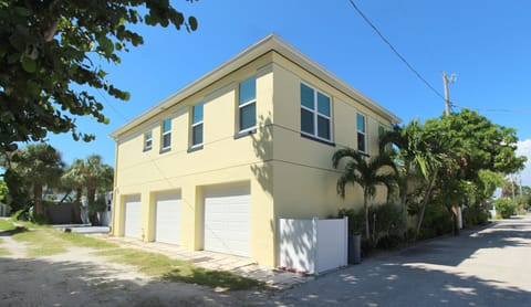 SE view of apartment atop the 3-car garage - one bay is reserved for you!