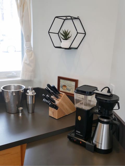 We also have a Moccamaster, microwave, electric kettle, and toaster for your use