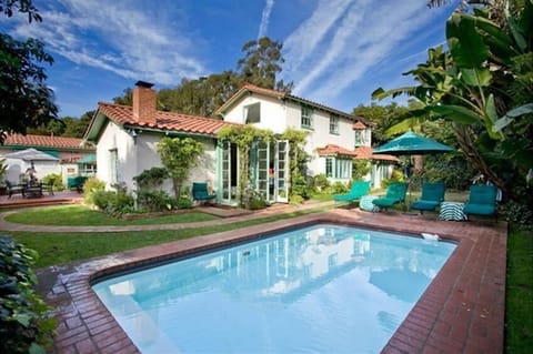 Back of the House with Gardens and Pool with Swim Jet.