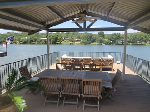 Large covered deck over boat dock