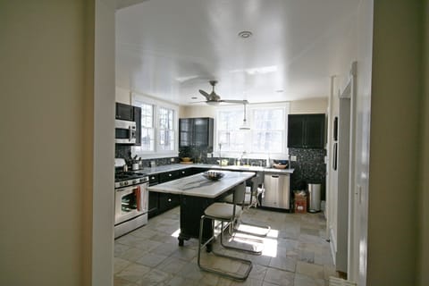 Standing in the prep pantry looking into the main kitchen