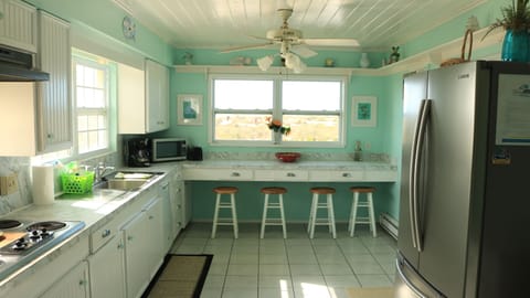 Kitchen bar looks over the Gulf of Mexico