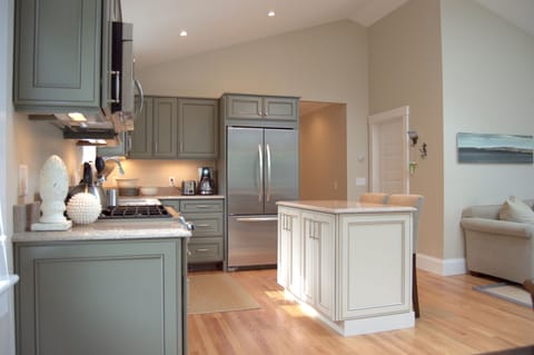 Large Kitchen area with full size appliances, and completely stocked for a cook