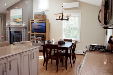 The interior dining room seats six comfortably, and there is the outdoor area 