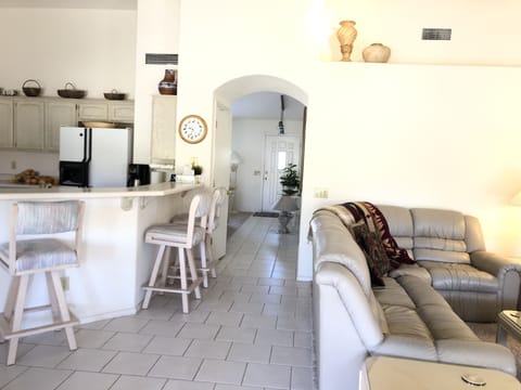 View to the front door from the family room.