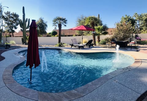 Large back yard with private pool and 6' stucco walls surrounding entire yard