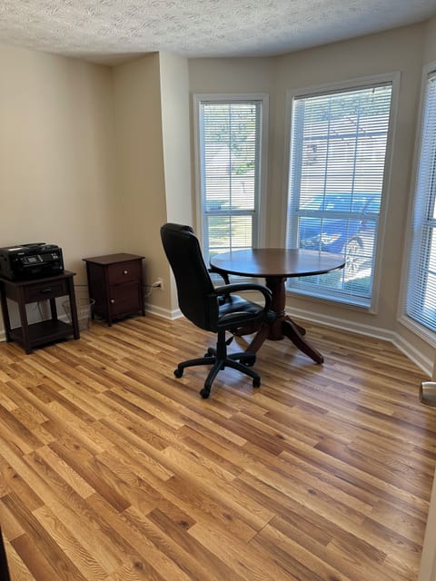 Office with day bed, front of house