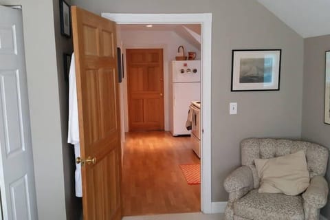 View from Bedroom to hallway/kitchen.