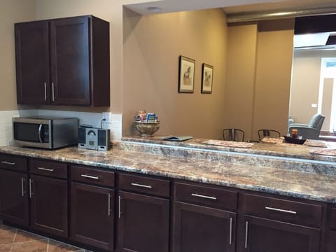 Breakfast bar and plenty of counter space to prepare and serve meals