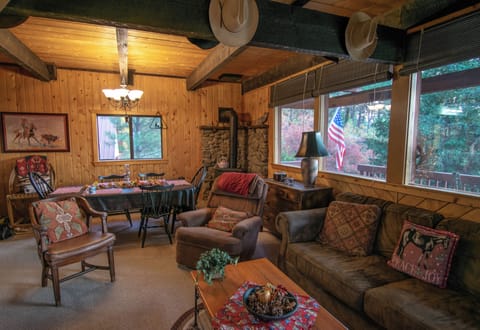 Living and dining area has gas log fireplace and stunning views!