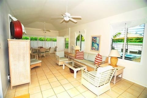 Living room with dining table at far end by the kitchen

