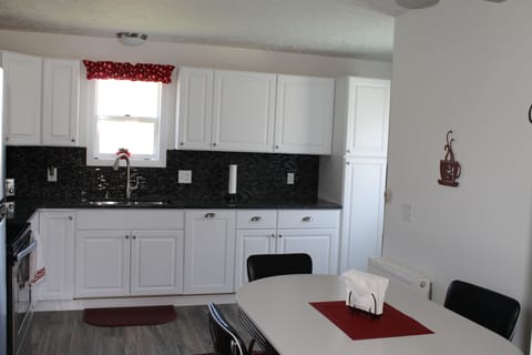 NEW kitchen, granite counter tops, new appliances!  Very clean and open!