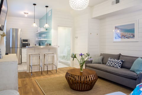 Downstairs den, kitchen and bathroom.