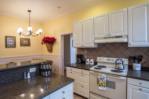 Sunny Kitchen with almost everything needed for cooking.