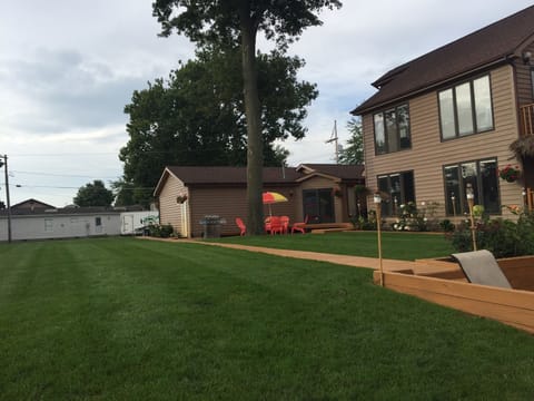 View of the back deck and Condo attached to the owners house on the right