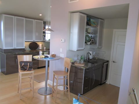 Wet bar w/ wine cooler off 2nd floor great room. plus half bathroom off wet bar.