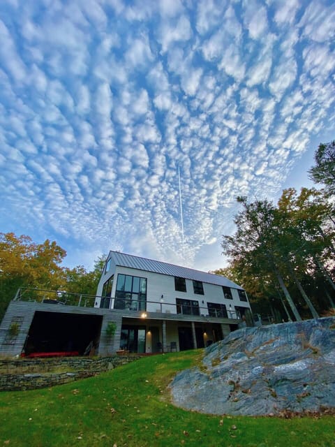 We call the house "The Arc" because it stands high with views out to the water, trees, and sky
