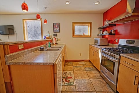 Bright simple kitchen with all the goodies you'll need to cook and create.