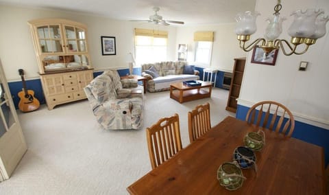 spacious living and adjacent dining room (old furniture- photo to show space)