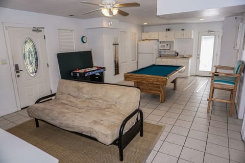 The wreck room features 7 foot pool table and air hockey and big screen TV