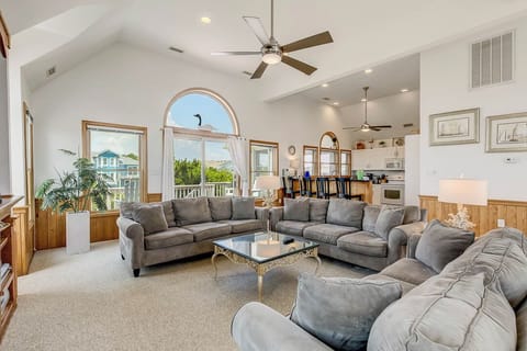 Top-Level Living Room with Deck Access