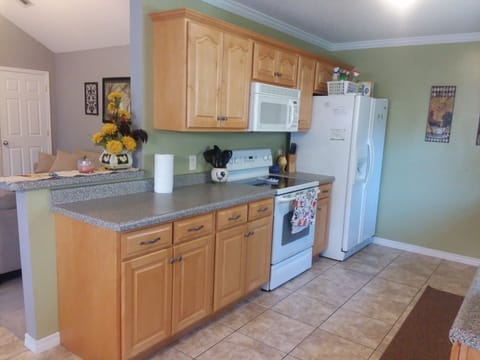 Kitchen (left) includes ice, water, coffee, tea, paper supplies, pots and pans.