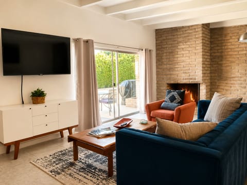 An inviting, open-concept living room designed for ultimate relaxation and comfort during extended stays.