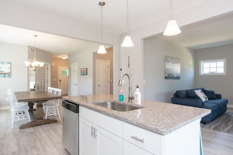 Open concept layout.  Dining flows to kitchen flows to family room.  