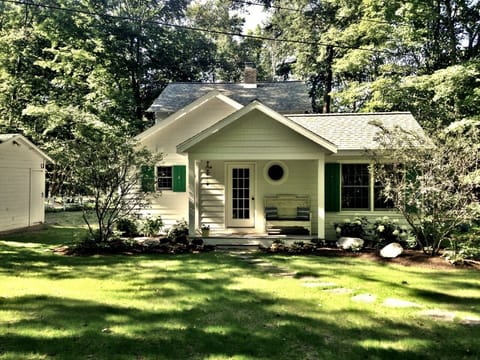 View of home from the backyard w/welcoming landscaping.
