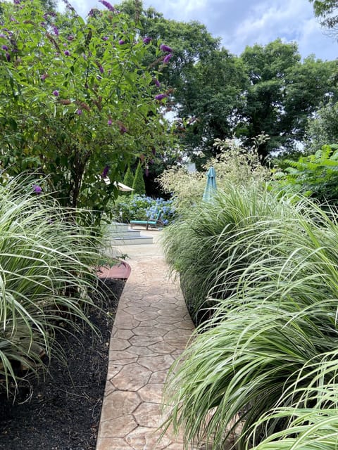 Walkway to backyard and outdoor shower