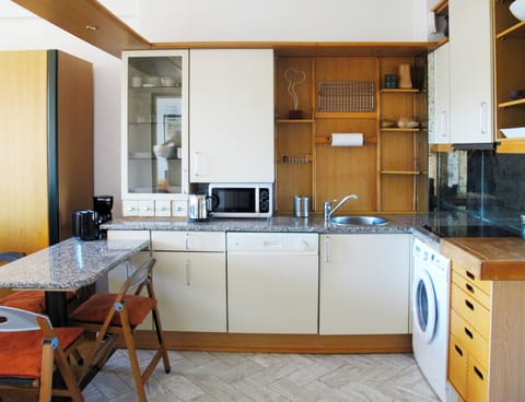 Bright fully-equipped kitchen