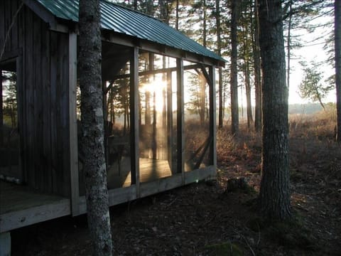 Screened gazebo at sunset