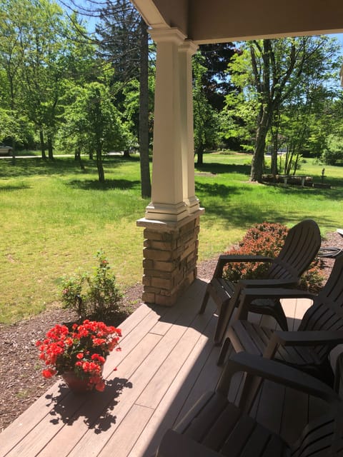 Enjoy your cup of coffee on the peaceful front porch listening to the birds. 