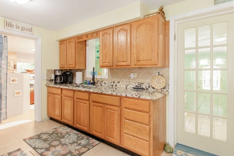 fully stocked kitchen. Keurig, mr coffee and coffee press.sugar powdered creamer