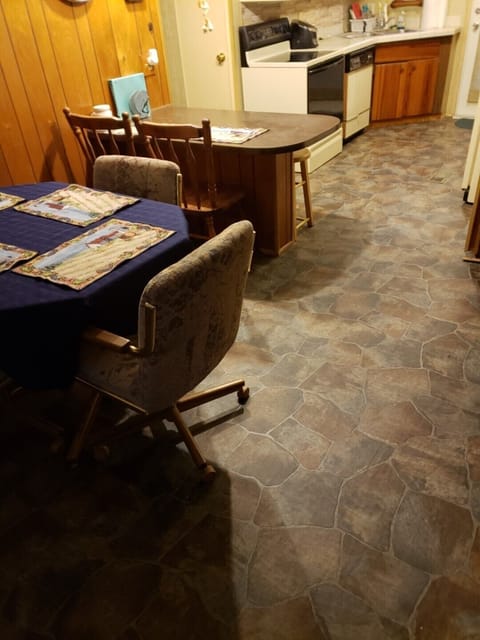 New "Stone" design floor in the dining room, kitchen, hallway, and 2nd bedroom.